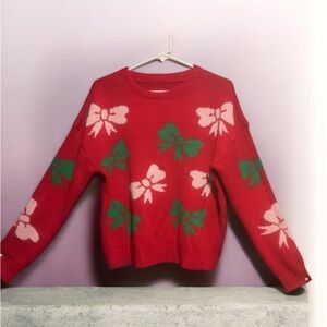 Chic Red Sweater with Green and Pink Bows